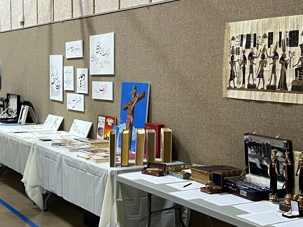 Farsi artwork and faith resources shared at a community gathering
